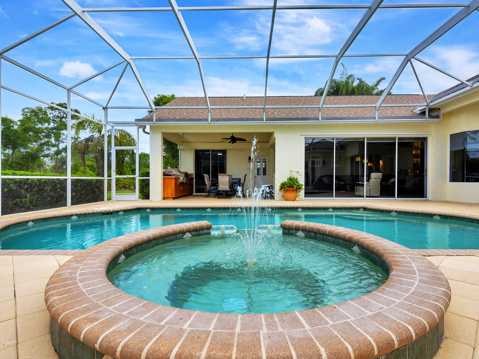 Cinematic backyard pool and patio deck real estate photography in Palmer Ranch, Sarasota, FL, captured by HDR Media Pro.