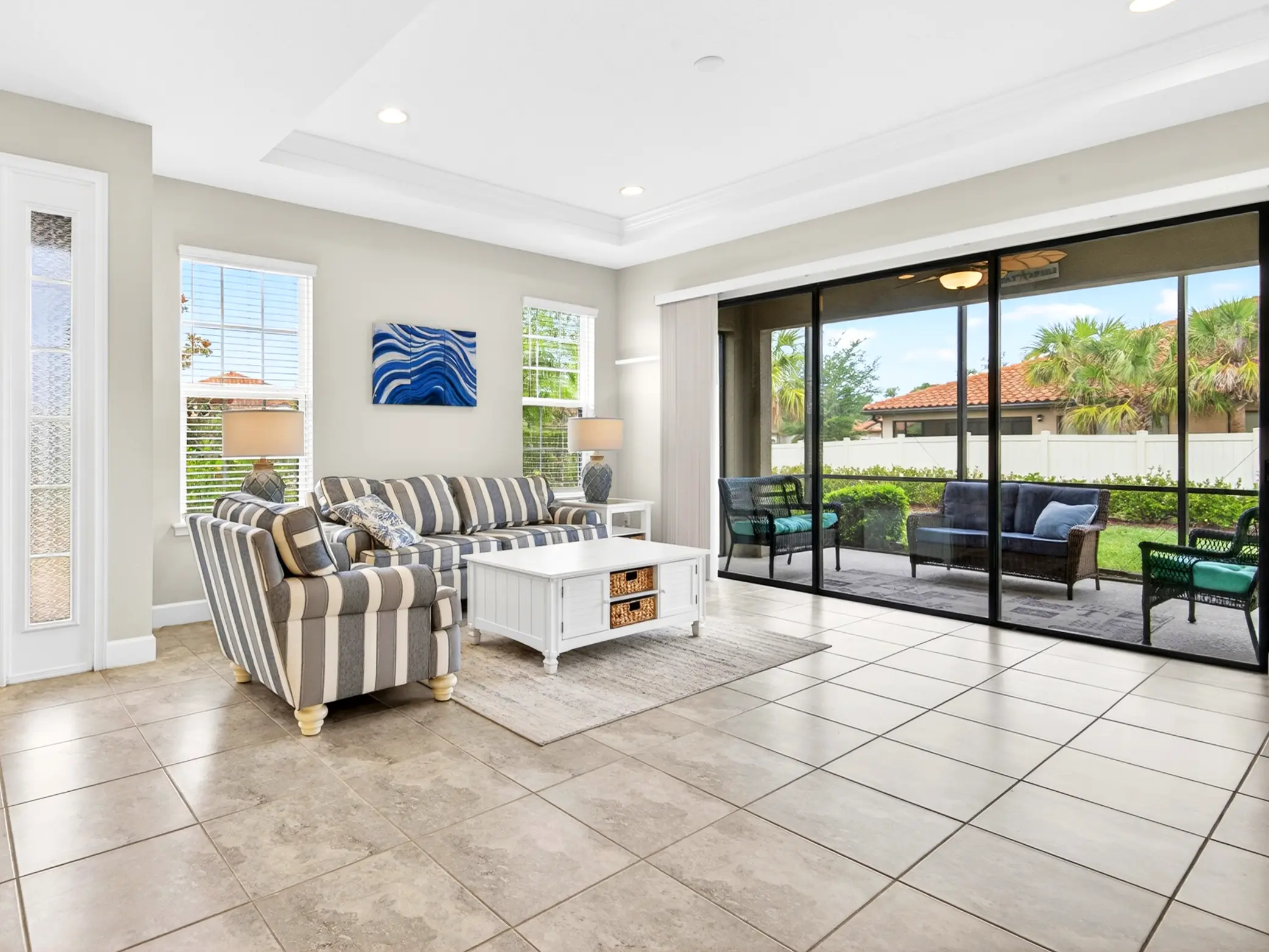 Open Concept Living Area of a luxury residential property in Parrish, Florida. This bright and spacious living room layout featuring premium styling, comfortable seating, and open-concept flow on the Florida Gulf Coast, captured with professional real estate media standards.