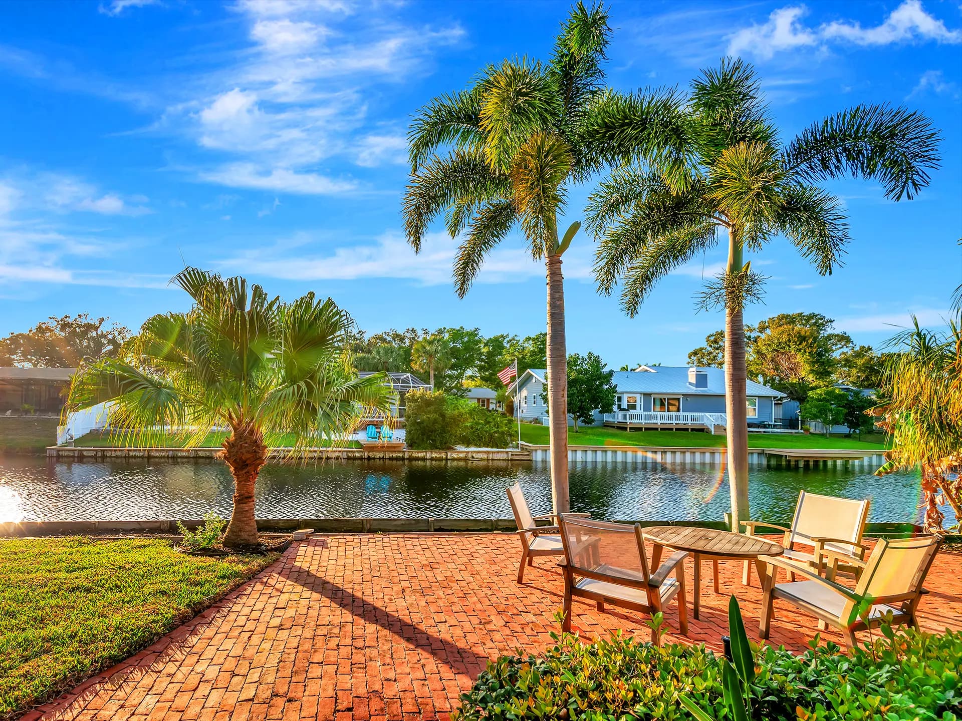 Aerial drone media of a waterfront single family property in Palma Sola, Bradenton, FL, produced by HDR Media Pro.